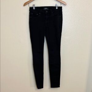 The Castings Aritzia Mid Rise Skinny Overdye Black Jeans